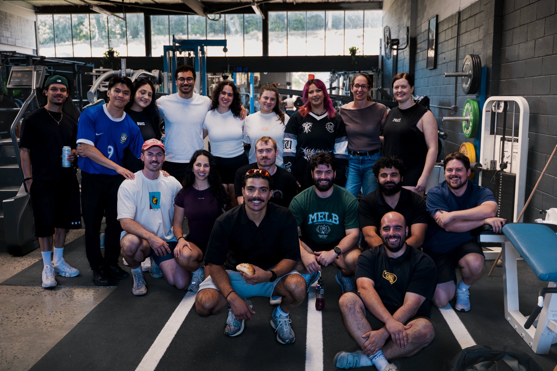 The training group together on the gym floor